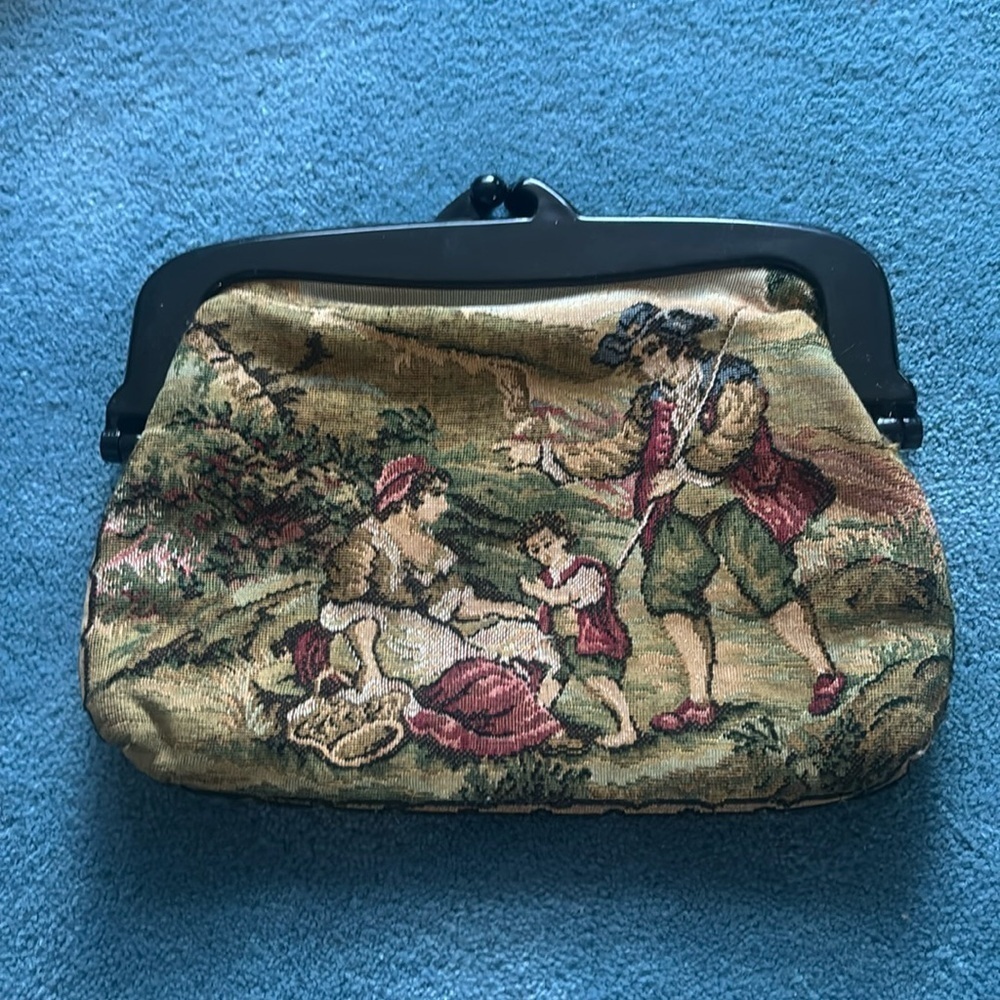 Tapestry clutch